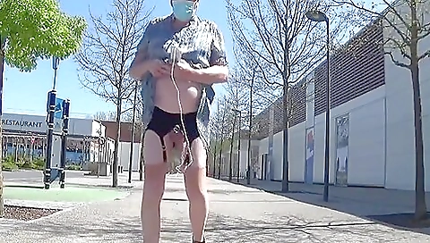 Mature blonde is playing with her sexy skirt and pussy