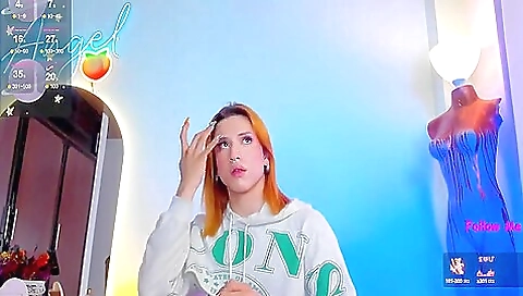 Red head with a sexy tattooed body is masturbating