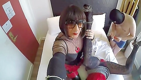 Hot brunette plays with her own twat in the hotel room