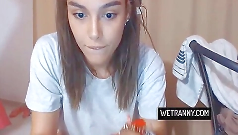 Big tittied brunette with tattoos is naked on the couch