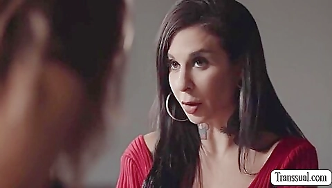 Busty tattooed tranny gets fucked by a sexy shemale