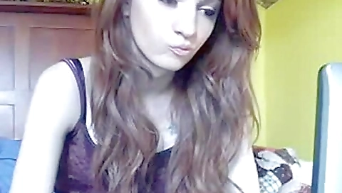 Cute brunette in a white dress in a solo porn video